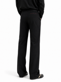 Black tailored wide-leg trousers — back view showing heartbeat embroidery at waistband
